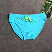 Load image into Gallery viewer, Pride Month Edition Swim Trunks with Rainbow Flag Speedos sky blue