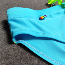 Load image into Gallery viewer, Pride Month Edition Swim Trunks with Rainbow Flag Speedos sky blue